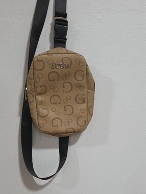 GUESS Monogram Crossbody Belt Bag in Tan with Black Strap